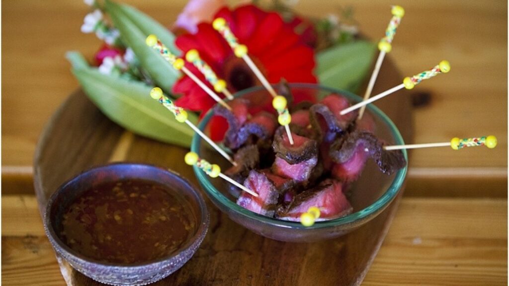 Decorative beef appetiser with cocktail sticks